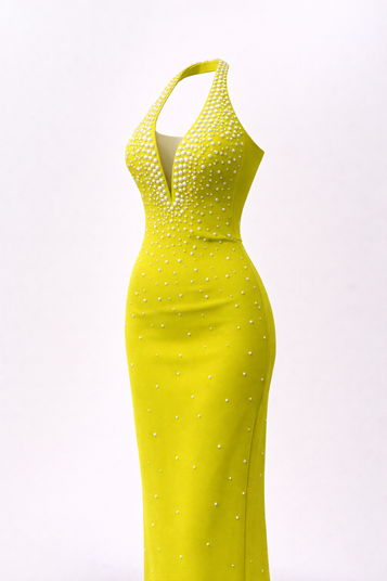 Abito da sera color verde pistacchio con scollo all'americana e dettagli in perle 